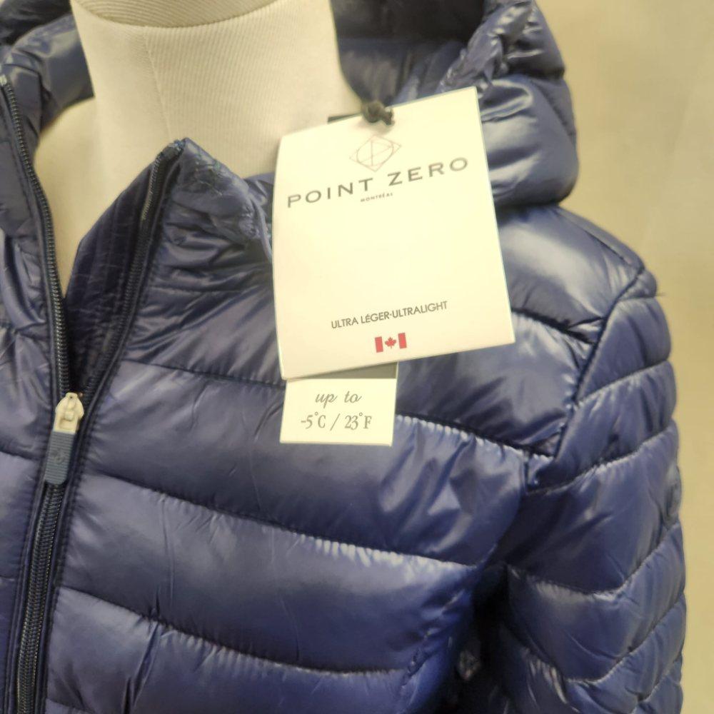 View of the tag on Point zero ultra light weight spring jacket in navy 