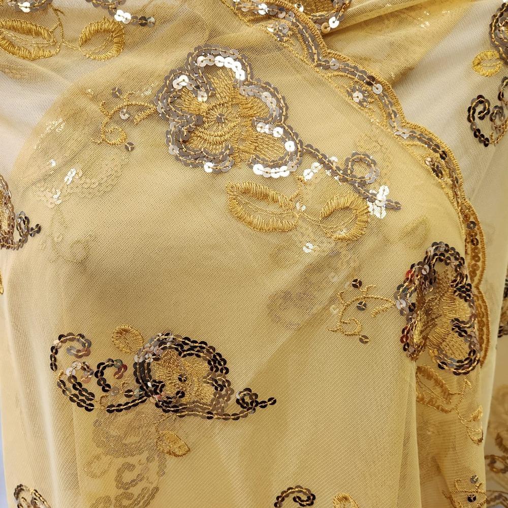Detailed view of scarf with embroidery & gold sequin