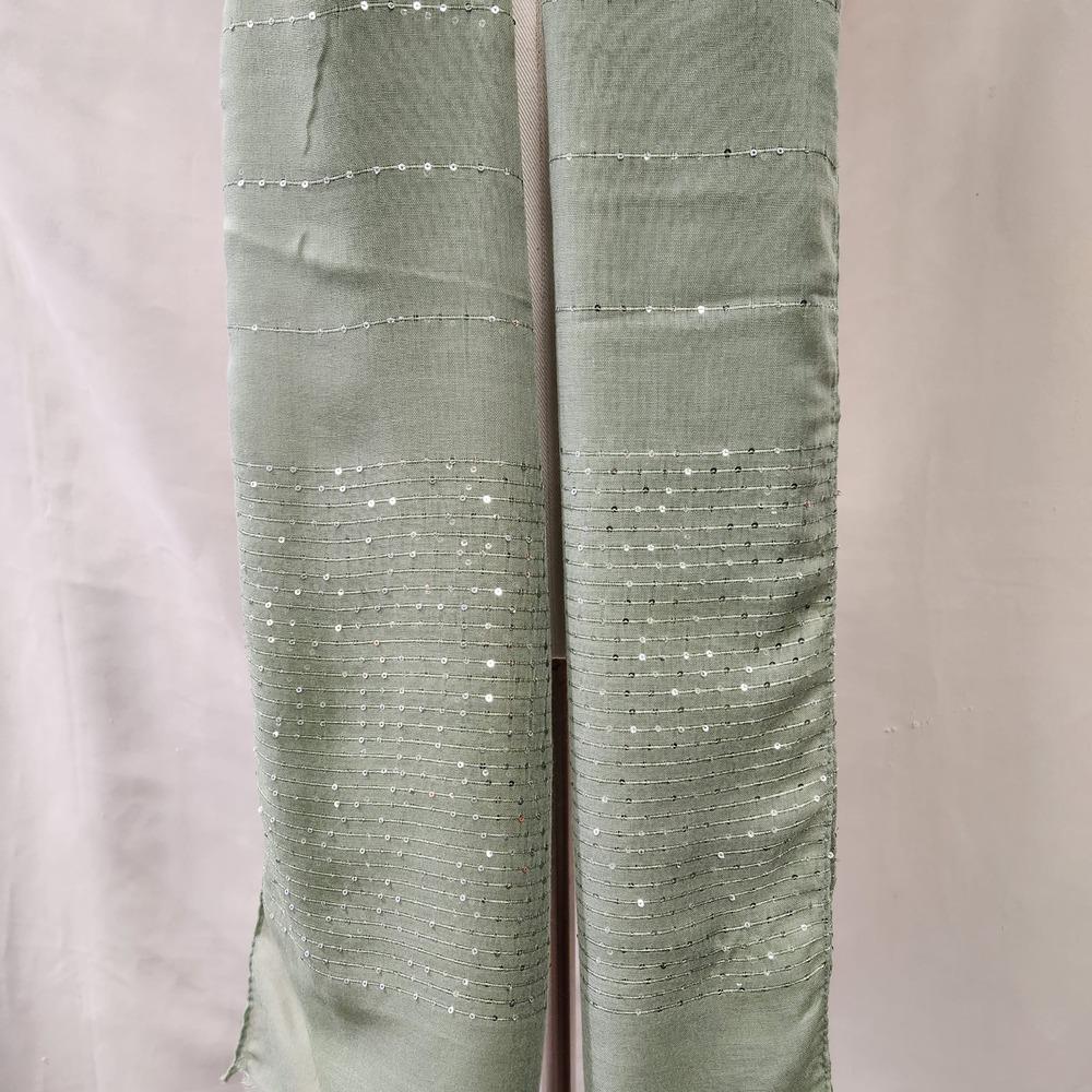 Detailed view of Green summer scarf with light sequence detail