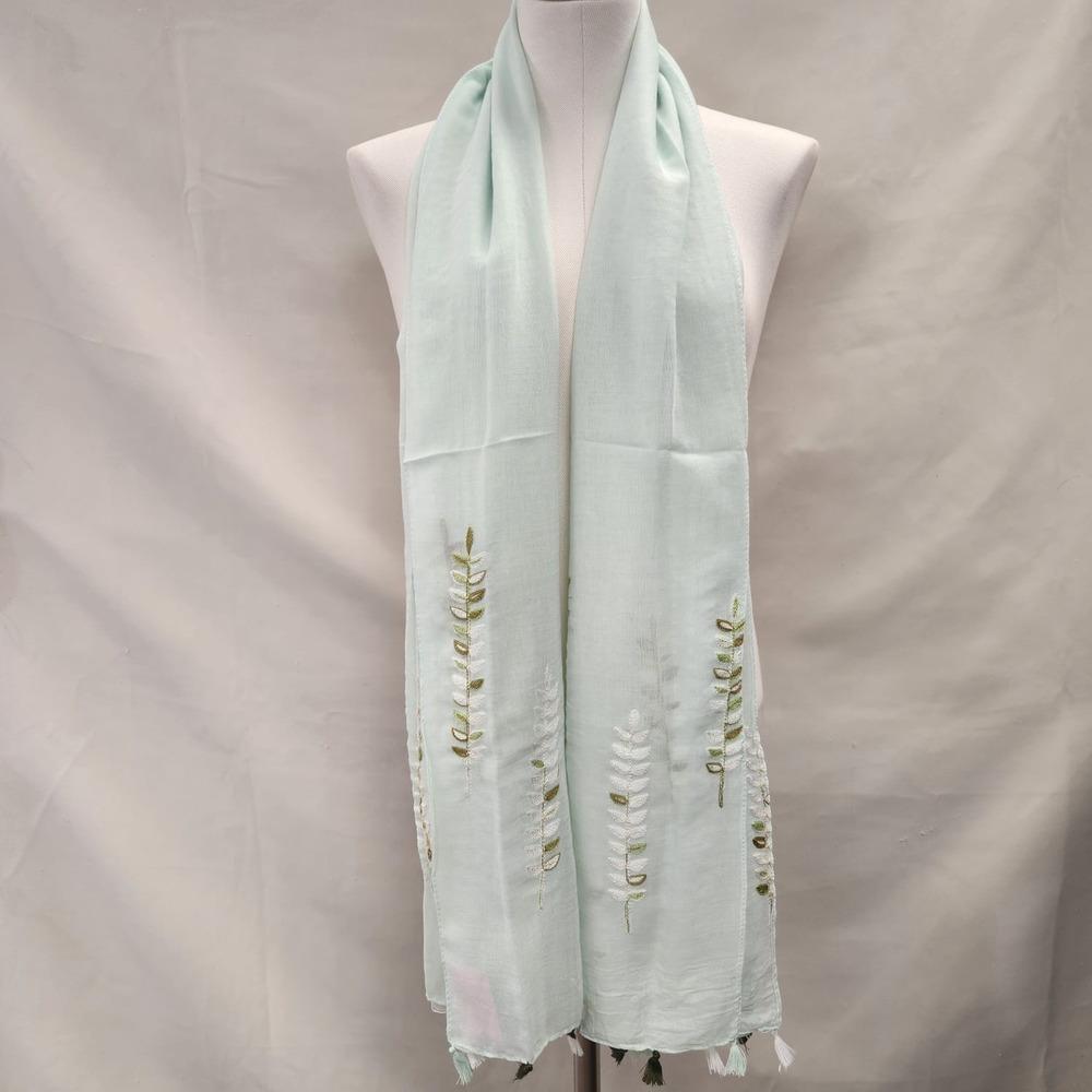 Pastel green summer scarf with colorful embroidery