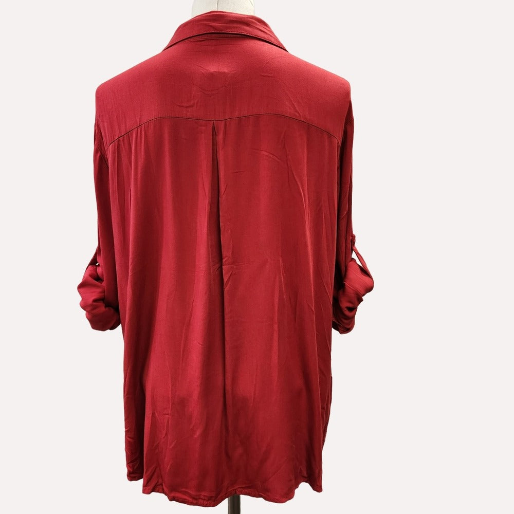 Rear view of red dress shirt with classic collar and full sleeves