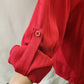 Roll up sleeves detailed view of red dress shirt
