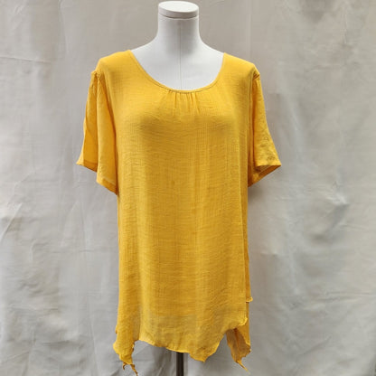 Front view of short sleeve yellow layered top with pleated necknline