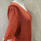 Alternative side view of Short sleeve red layered top with pleated necknline