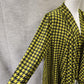 Side view of Light open front top in yellow with black houndstooth pattern