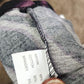 Inside tag on animal print shawl collar top