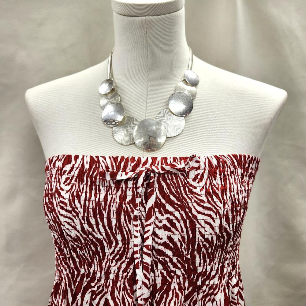 Smocked upper of Zebra print burgundy and white top