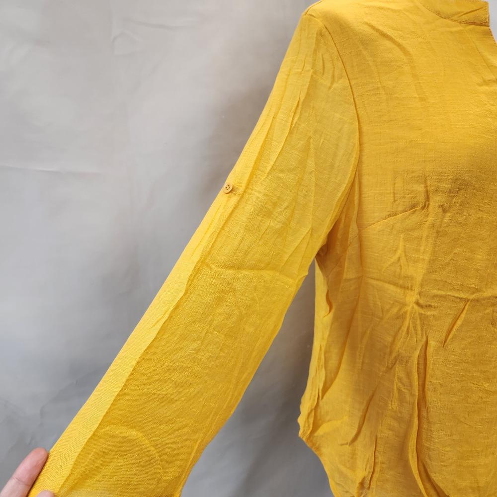 three quarter length sleeves of layered yellow summer top