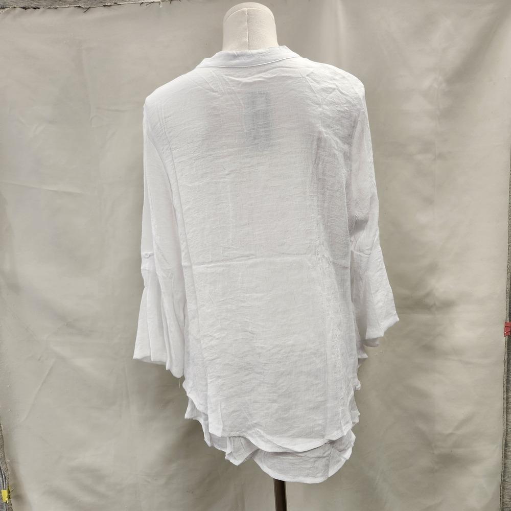 Rear view of Layered white summer top with roll up sleeves