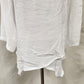 Asymmetric hemline of white layered top