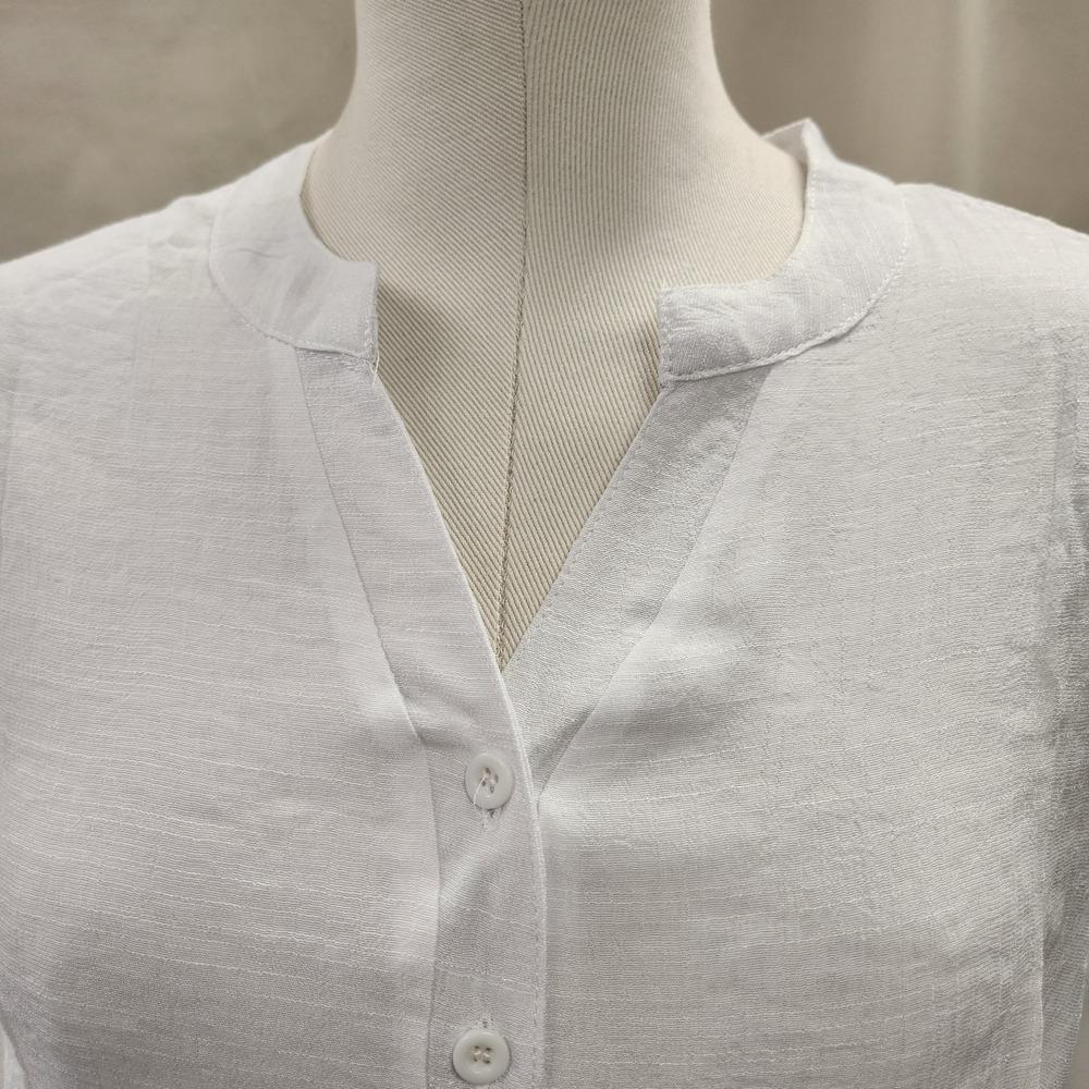 Notch neckline of layered summer top in white