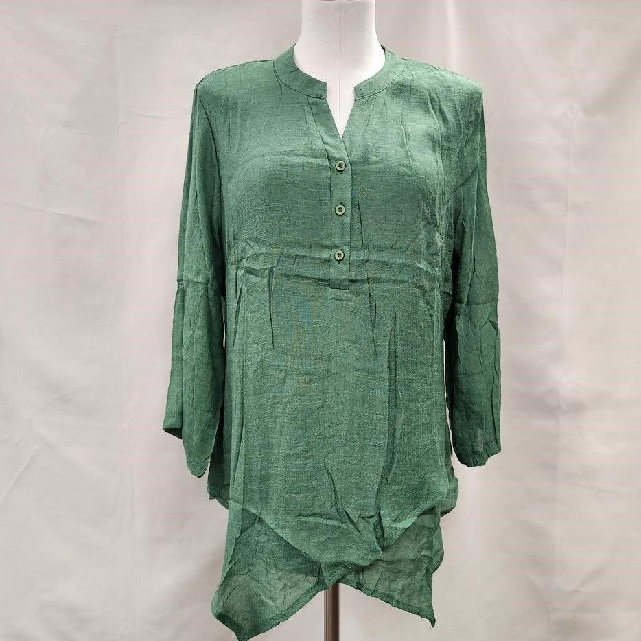 Full front view of layered green summer top with roll up sleeves