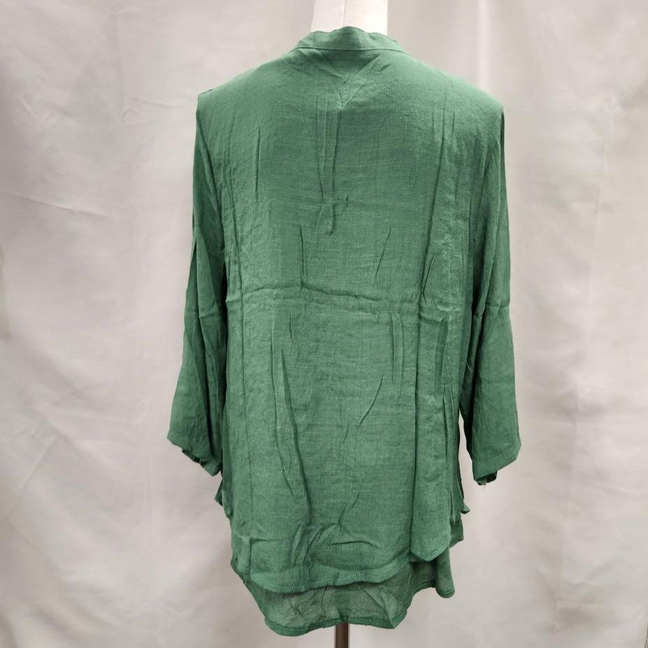 Rear view of Layered green summer top with roll up sleeves