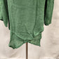 Asymmetric hemline of layered green summer top