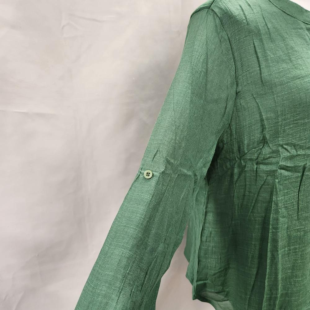 View of 3/4 sleeves of layered green summer top