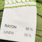 Material composition tag of light green top