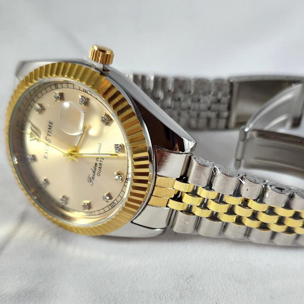 Side view of dual tone elegant wristwatch for men