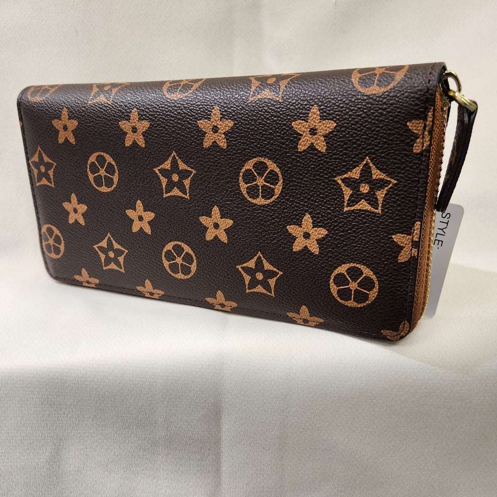 Brown wallet with tan floral pattern