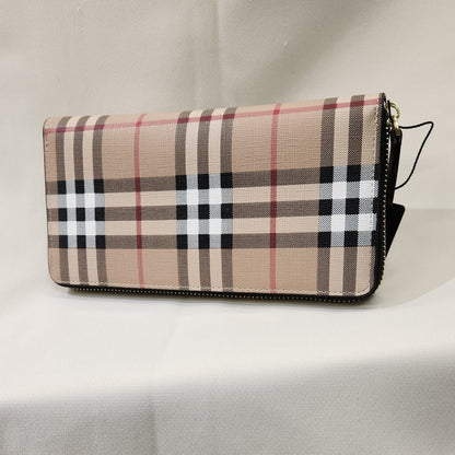 Front view of Wallet with black trim and multicolored plaid pattern