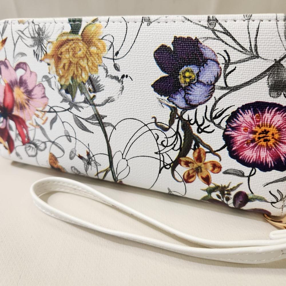 Closer look at the floral print of colorful wallet