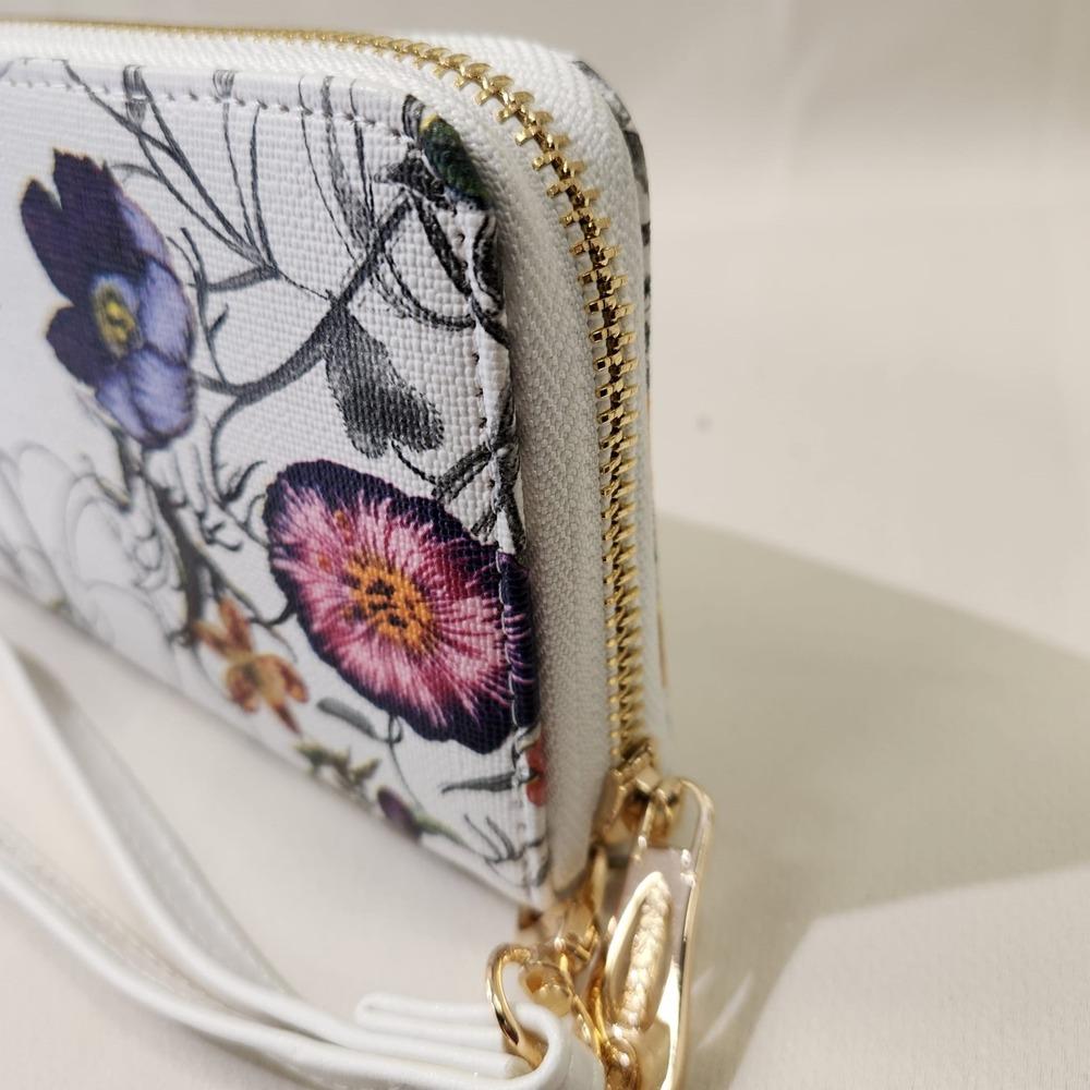 Gold hardware of colorful floral pattern wallet