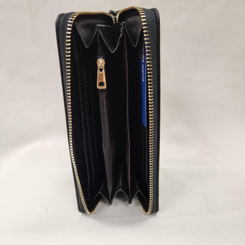 Inside view of Black wallet with gold hardware