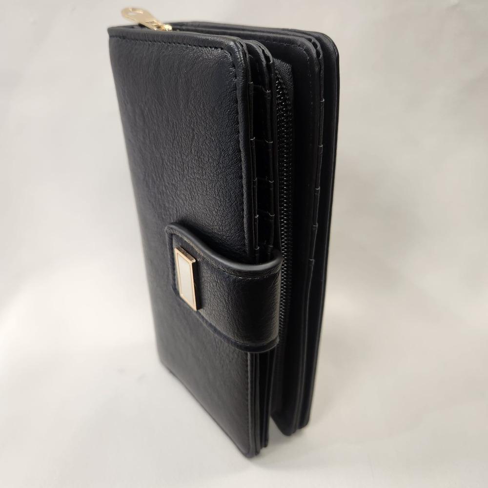 Multi compartment black wallet with gold hardware placed vertically