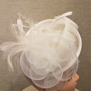 Top view of White cambric with feathers fascinator