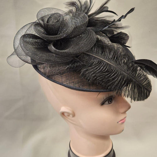 Another side view of Black cambric with feathers fascinator