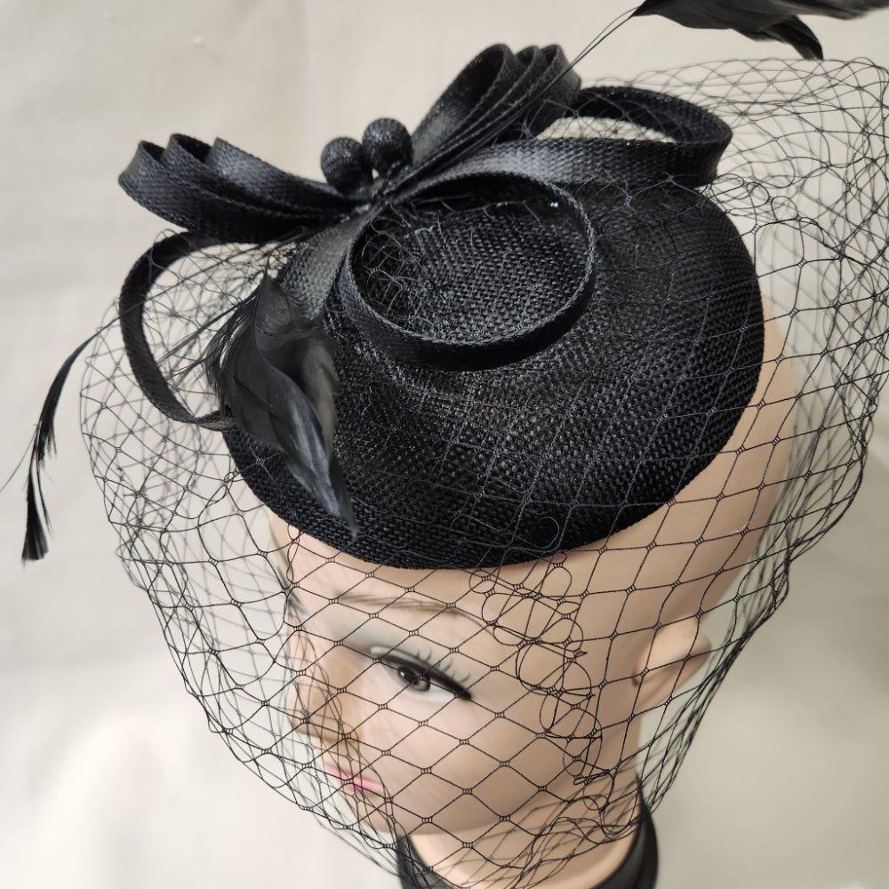Top view of Elegant cambric fascinator in black with veil