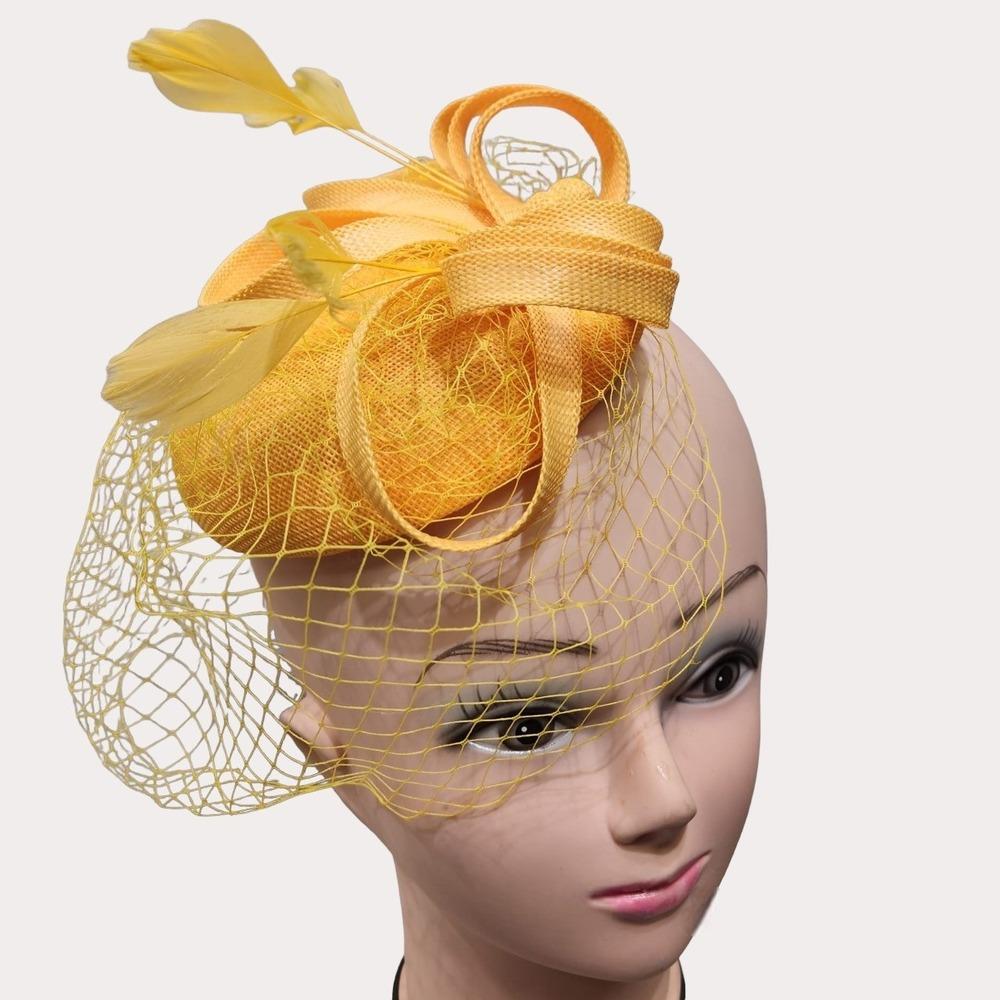 Detailed view of Elegant cambric fascinator in yellow with veil