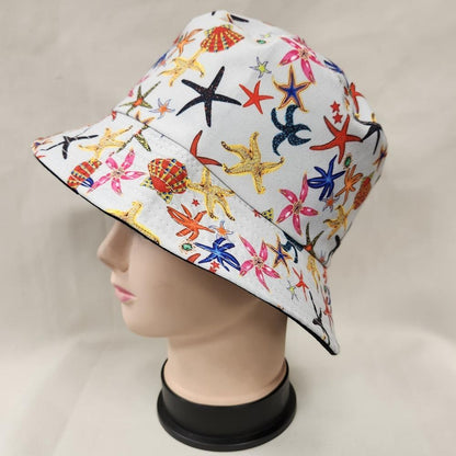 Side view of Bucket hat in beige with colorful summer print