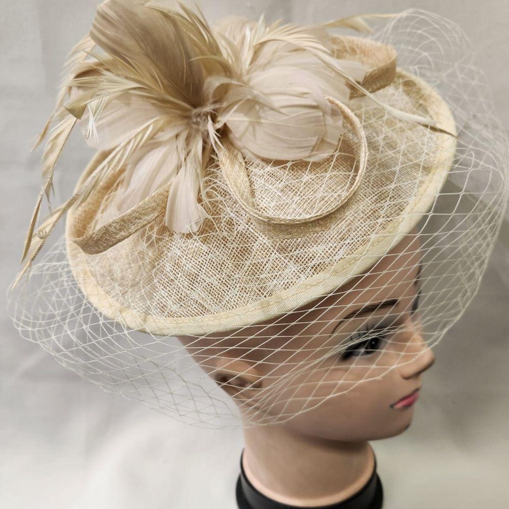 Another view of Beautiful cambric fascinator in beige with veil