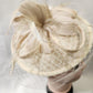 Beige Cambric fascinator with veil