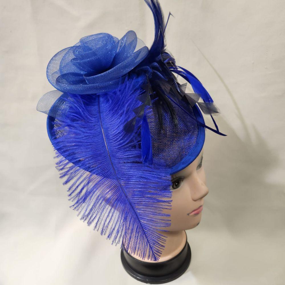 Blue cambric fascinator with blue and black feathers