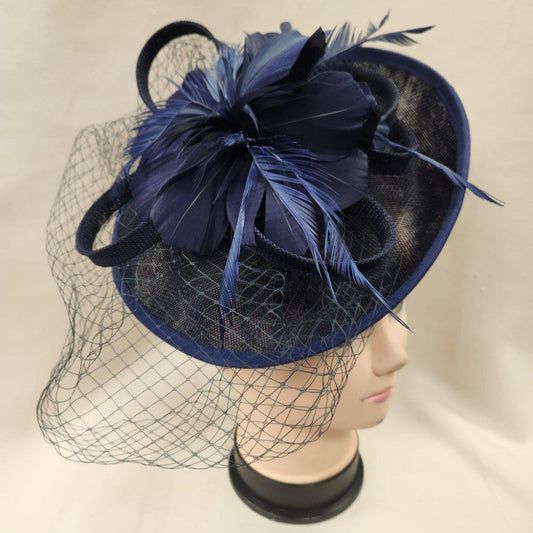 Navy Blue cambric fascinator with feathers and net veil