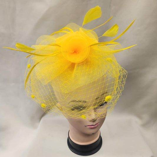Classic yellow fascinator with veil