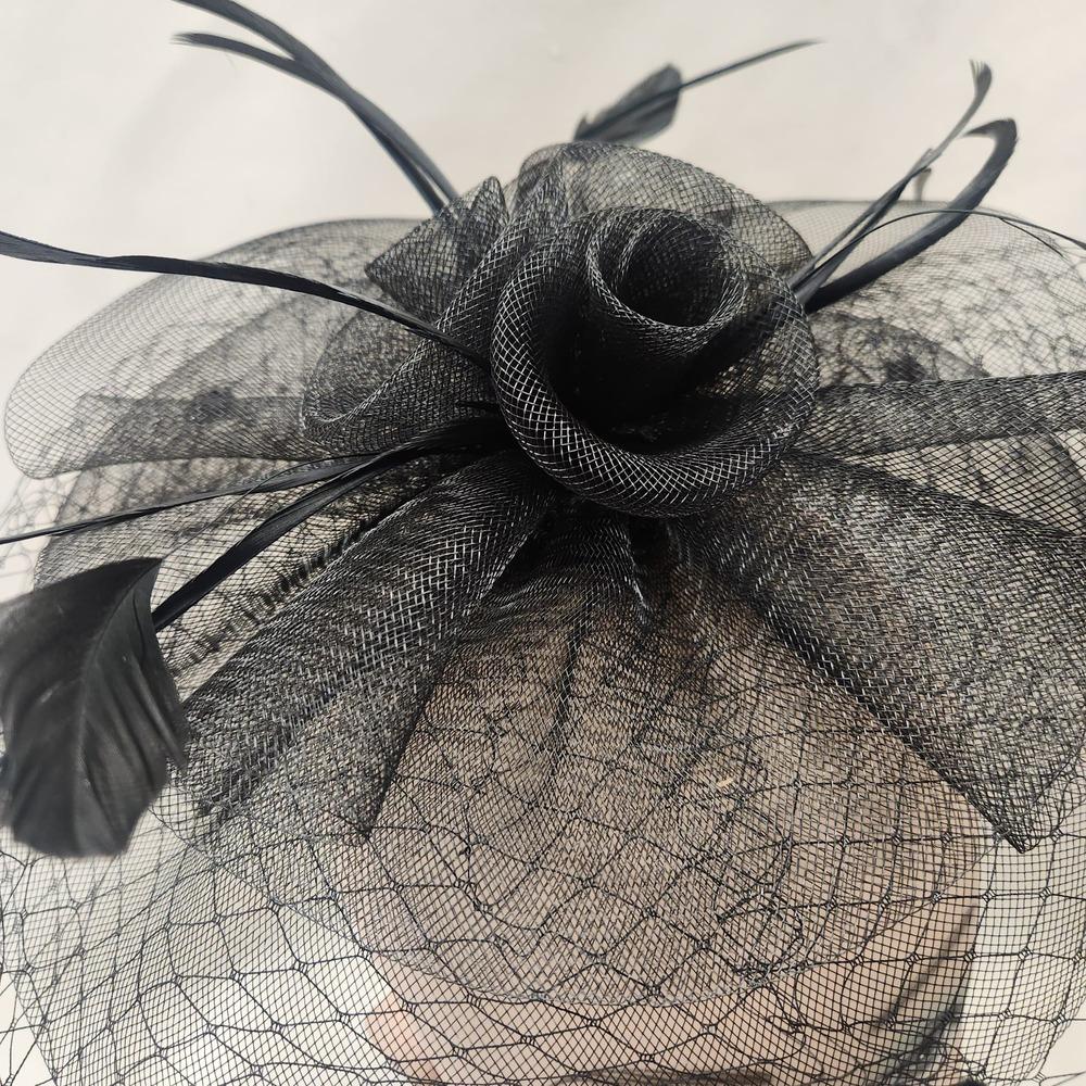 Detailed front view of Classic black fascinator with veil