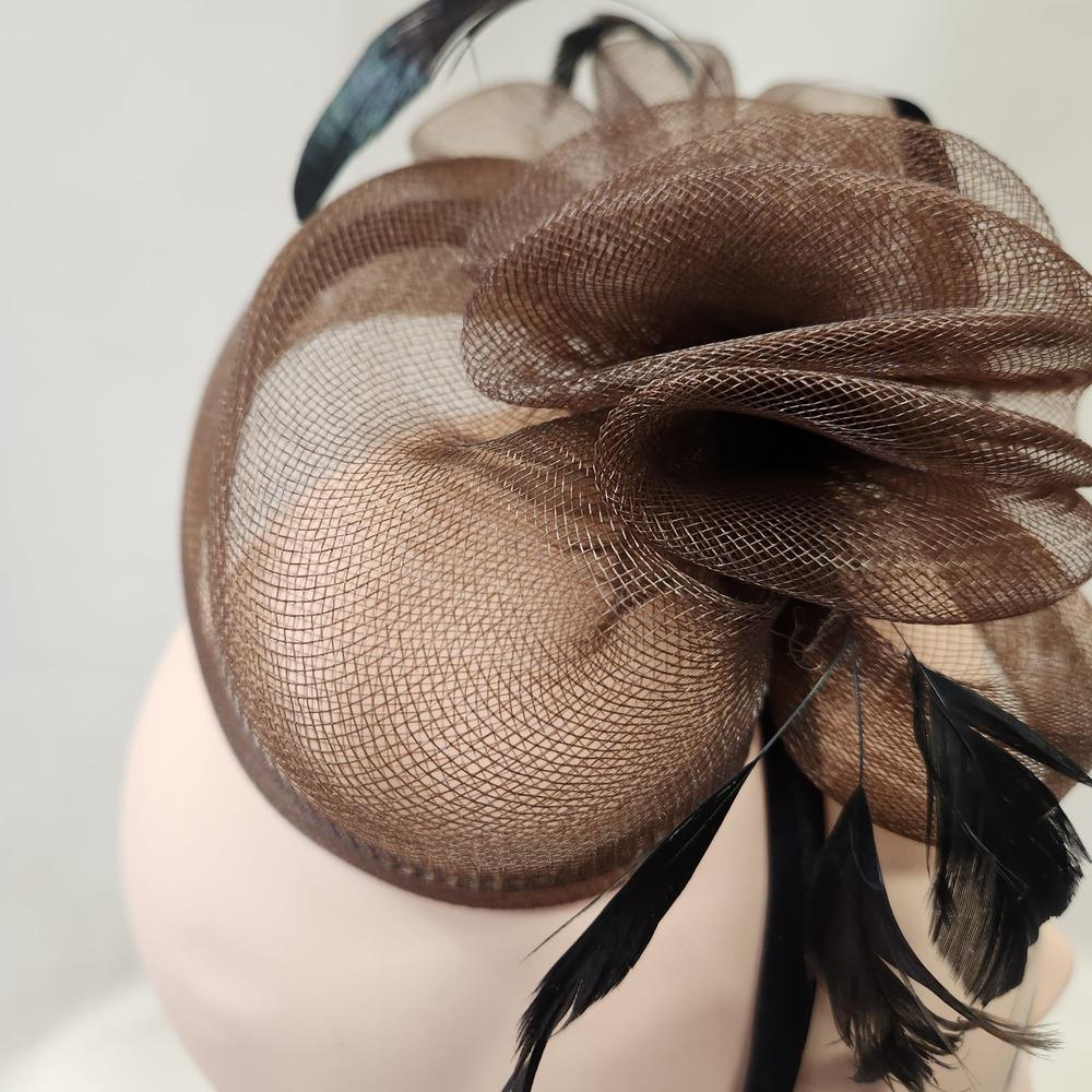 Side view of Brown fascinator with hairband