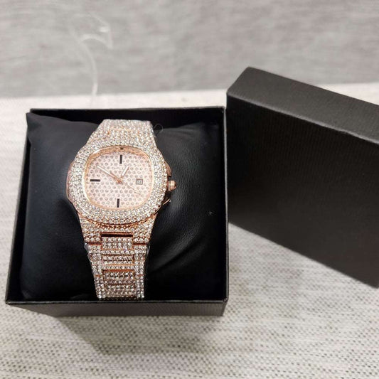 Beautiful wrist watch in rose gold with stone embellished strap and dial