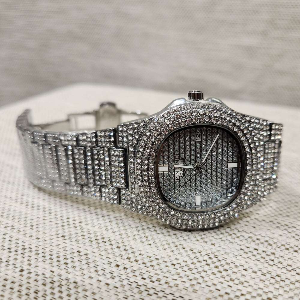 Another view of wrist watch in silver with stone embellished strap and dial