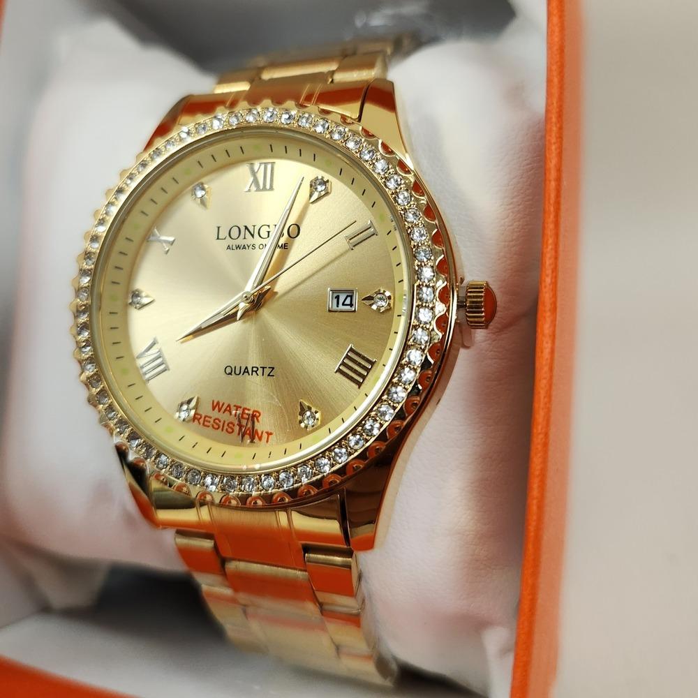 Detailed view of stone studded rim wristwatch for women