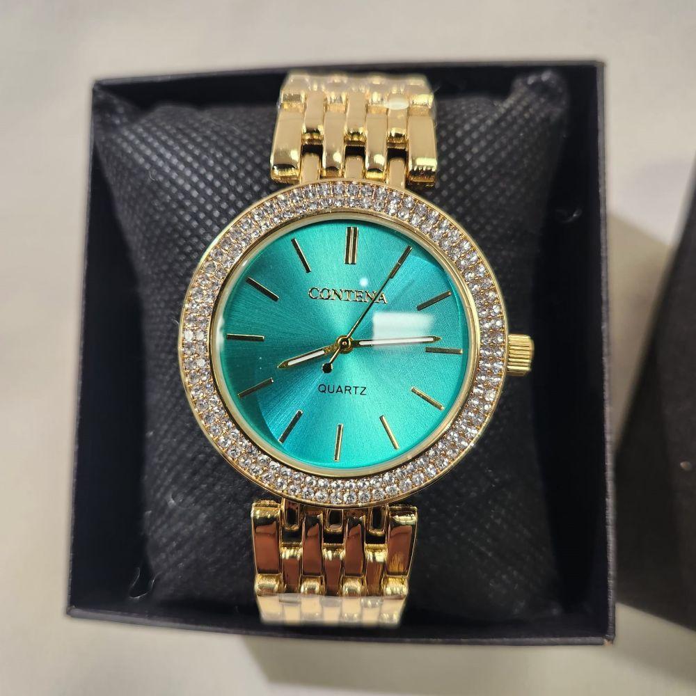 Detailed view of Wristwatch for women with green inner dial and stone studded rim