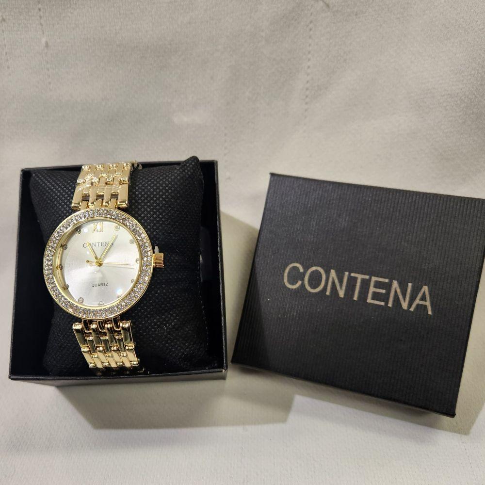 Wristwatch for women with white inner dial and stone studded rim 