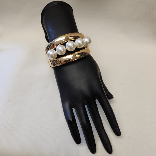 Broad cuff gold bracelet with pearls