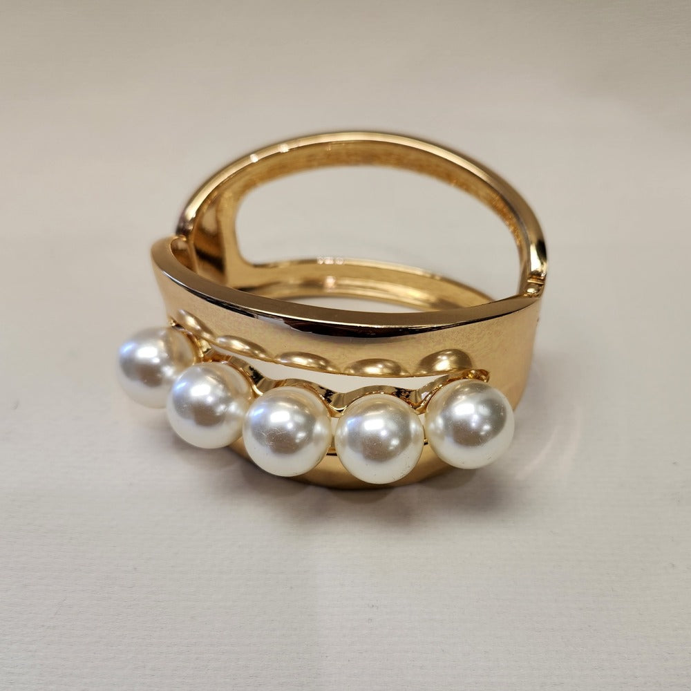 Another view of Broad cuff gold bracelet with pearls