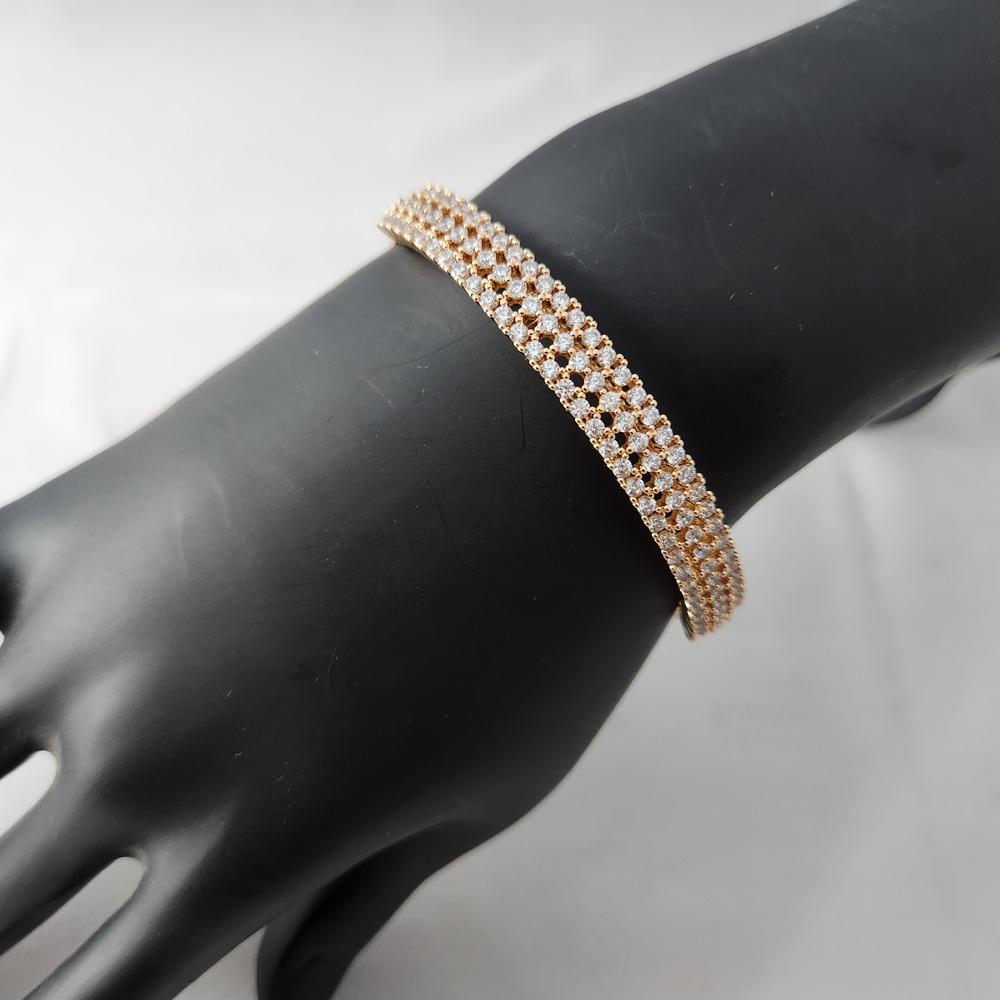 Detailed view of classy gold bracelet with clear stones