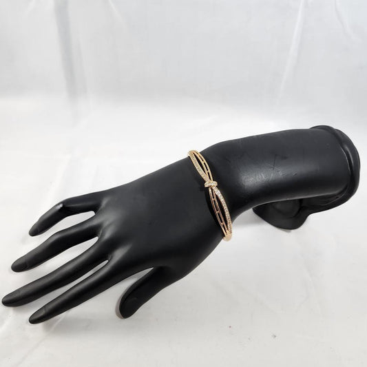 Modern design gold bracelet with fine stones