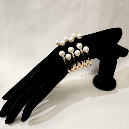 Gold cuff gold bracelet with pearl embellishment