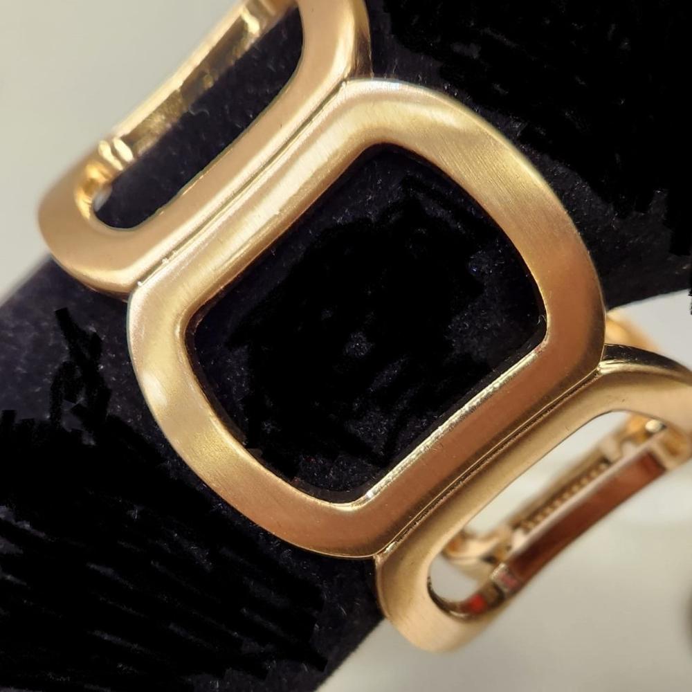 Detailed view of Modern design dull gold hinged bracelet